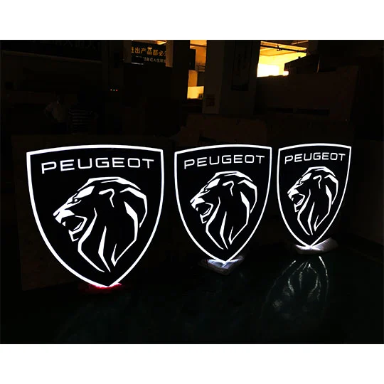 peugeot car sign